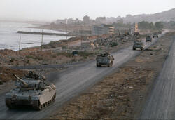 The military clashes between Israel and various Lebanon-based militant groups trace back to Israel's founding in 1948, after which Lebanon and its neighbors declared war. Following the PLO's establishment in Lebanon in 1968, Israel invaded twice—in 1978 (Operation Litani) and in 1982—occupying southern Lebanon. In response, Hezbollah was formed to resist the occupation.

Israel withdrew in 2000, but conflict reignited in a month-long war with Hezbollah in 2006, which left significant damage in Lebanon but strengthened Hezbollah's political position. Since then, border skirmishes have continued, escalating further since the outbreak of the Israeli-Palestinian war in October 2023. 

As of March 2026, following the U.S.- and Israel-backed assassination of Iran’s Supreme Leader, Ali Khamenei, 700,000 people have been displaced in Lebanon following intense Israeli airstrikes and evacuation orders.

Magnum photographers have documented this enduring conflict for decades.