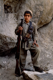 AFGHANISTAN. 1979. Afghan boy with rifle posing.