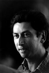 It is with great sadness that we announce the passing of beloved Magnum photographer Chris Steele-Perkins, aged 78.

Chris Steele-Perkins was born in 1947 in Rangoon, Burma, now Myanmar. His father was English, and his mother Burmese. From the age of two, he lived in Burnham, England, with his father, and attended school in Sussex, before studying Psychology at the University of Newcastle upon Tyne. He worked on the student newspaper and was inspired to become a photojournalist by documentary essays he had seen in The Sunday Times by photographers including Don McCullin.

For the first two decades of his career, Steele-Perkins focused his work on social conditions in Britain. Living in London in the 1970s, he photographed the capital’s residents and customs, including street parties in Brixton, where he lived. In 1975, he joined the Exit Photography Group. With Nicholas Battye and Paul Trevor, he documented inner city poverty from Glasgow to Middlesbrough, during a time of economic transition in urban Britain. The resulting book, Survival Programmes, includes interview transcripts, drafts and other materials, forming a thorough reportage of both social values and social justice.

Steele-Perkins’s work with the Exit Group sought to weave together different types of social violence against poor communities in Britain at the hands of the government, whose military strategies in Northern Ireland became the blueprint for police expansion across many major British cities. In Belfast, Steele-Perkins met individuals who squatted in the city’s Divis Flats, and portrayed the lives of its Catholic communities. This work was later collected in his 2021 publication, The Troubles.
“I intended to cover the situation from the standpoint of the underdog, the downtrodden: I was not neutral and was not interested in capturing it so,” he wrote in the introduction to The Troubles. “I was interested in how life was lived in its various facets, not just the rioting and the military occupation, though I couldn’t ignore that which was so prevalent, but also the leisure, the entertainment, the homes, the fun, the funerals and the community. I was not there to illustrate a thesis but to enter the unknown, interacting and responding, and attempting to remain honest. […] I began to see that my work in Northern Ireland had always been a celebration of the resilience and unyielding way that the Catholic community resisted.”

Pursuing his interest in socio-political conflicts, Steele-Perkins also captured racist movements and their counter-movements in Britain in the late 1970s and ‘80s, when right-wing political parties such as the National Front were gaining support. His series for the Sunday Times Magazine took him to Wolverhampton, where he explored the lives of ethnic minorities ten years after Enoch Powell’s controversial speech condemning immigration in Britain. In 1979, he photographed South Asian communities protesting in Southall, West London in response to the death of left-wing activist Blair Peach, who was thought to have been killed by a police officer.

Steele-Perkins’ three-year project on 1970s revivalists of the Teddy Boys, a subculture that began in the 1950s, further attests to his interest in investigating the various facets of British identity and his dedication to immersing himself in his subject matter. Traveling across England, he documented not only the revived trend but the everyday lives of the rebellious youth. The project became his seminal book The Teds, published in 1979. “What I tried to do was to document a subculture, and quite a major one in British society,” he said. “I went into their homes and documented them in all kinds of contexts, and the clothes, in the end, became relatively peripheral to the whole thing. […] It’s much more about identity and who we are.”

That same year, Steele-Perkins joined Magnum Photos, and turned his focus to stories further afield. Initially planning to visit Zimbabwe for a week, he stayed in Africa for two months, an experience that inspired his gravitation towards the continent over the next two decades. 
Compelled to document social phenomena and the complexities of the human condition, Steele-Perkins’s projects were often driven by his personal curiosity. “Things grabbed me. The Teds grabbed me. The inner city problems grabbed me. Africa, for 20-odd years, grabbed me.”

In the 1980s, he took vivid images exploring people’s leisure pursuits in Thatcher-era Britain, published in the book The Pleasure Principle. “Previously my work had been focused on particulars of Britain: poverty, sub-culture. I did not have any parallel reality against which to properly assess my position,” he wrote in an interview around the book. “Exposure to other cultures, the massive shifts in relationships to people, the direct confrontation with the fact that things are different. Really different: worse, better, harder, more dangerous, shocking, fabulous, relaxed, harmonious… A kaleidoscope of experiences, of often extraordinary power, could not help but change my relationship to England…

“Now there was a sense of almost anthropological detachment, a heightened sense of life’s oddity, and the peculiarly surreal forms it takes in England.”

It was during this time that he made his transition into color photography, though some major projects, such as his 1994–1998 investigation of Afghanistan, were in black and white, still the favored medium of many photojournalists at the time. The photobook Afghanistan captures the photographer’s visceral experience of the country and its people: “It was heroic, beautiful, violent, twisted, gracious, and tragic,” he said. “The experience of being there works its way into one’s being; an infection of the soul demanding that you return.”

After his marriage to Miyako Yamada, Steele-Perkins embarked on a long-term photographic exploration of Japan, publishing Fuji in 2000. “Life got better and far more complicated, as it does when you fall hopelessly in love,” he said. “I now had a compelling reason for being in Japan and for photographing Japan, wanting to understand a place that had suddenly given me so much.” His book Echoes, a highly personal, diaristic account of his life over the course of the year 2001, is an intimate vignette of time passing and the reverberations of memory.

In 2007, he published Tokyo Love Hello, a love letter to the capital, along with Northern Exposures, a documentation of rural life in County Durham. In 2009, he published England, My England, a retrospective collection piecing together 40 years of photographing the country. His book on British centenarians, Fading Light, was published in 2012 and A Place in the Country, a year in the life of an English country estate was published in 2014. His project documenting diversity and migration in London was published in the photobook The New Londoners in 2019.

The photographer’s poetic approach to the medium is felt throughout his expansive career, during which he saw his images as “the fragments of memory, the silent echoes of experience.”

Steele-Perkins lived in East Dulwich in South London during the later period of his life, before moving to Japan with his wife Miyako. He passed away peacefully, aged 78, with Miyako at his side. 

Gregory Halpern, Magnum Co-President, writes: “It is with deep sadness that we reflect on the passing of Chris Steele-Perkins. Chris had a gift for finding lyricism in daily life — whether in the defiance and style of the Teddy Boys in The Teds, the resilience and struggle of communities across the UK in England, My England and The Troubles, or the quiet, intimate landscapes and portraits of Japan in Fuji. His photographs could be both tender and unsparing, revealing both dignity and difficulty in equal measure, and they have shaped the way many of us think about what photography can do.

“For 46 years, Chris was a vital part of Magnum Photos. His powerful photography helped define what photojournalism could be. His dedication to storytelling and generous mentorship shaped countless colleagues and inspired photographers and audiences everywhere.

“Our thoughts are with his family and friends. His loss is felt deeply within Magnum, but his influence will continue — in the images he leaves behind, and in the example he set for so many photographers who came after him.”